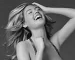 A typical woman laughing because she is more valuable than men